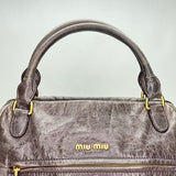 Two-way Charm Top handle bag in Distressed leather, Gold Hardware
