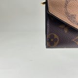 Zoe Reverse Compact Wallet in Monogram coated canvas, Gold Hardware