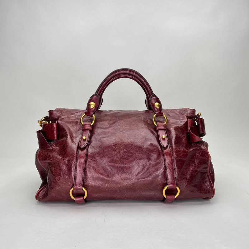 Fold Top handle bag in Distressed leather, Gold Hardware