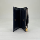 Cassandre Bi-fold Compact Zip Wallet in Caviar leather, Gold Hardware
