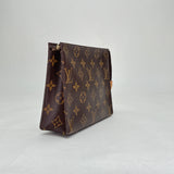 Toiletry 19 Pouch in Monogram coated canvas, Gold Hardware