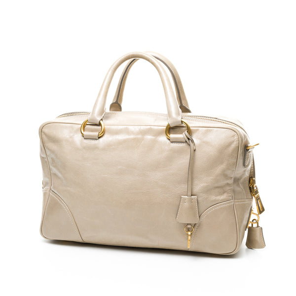 Vitello Shine Top handle bag in Distressed leather, Gold Hardware