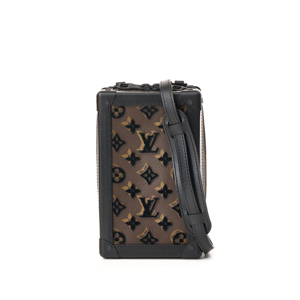 Vertical Soft Trunk Crossbody bag in Monogram Coated Canvas, Lacquered Metal Hardware
