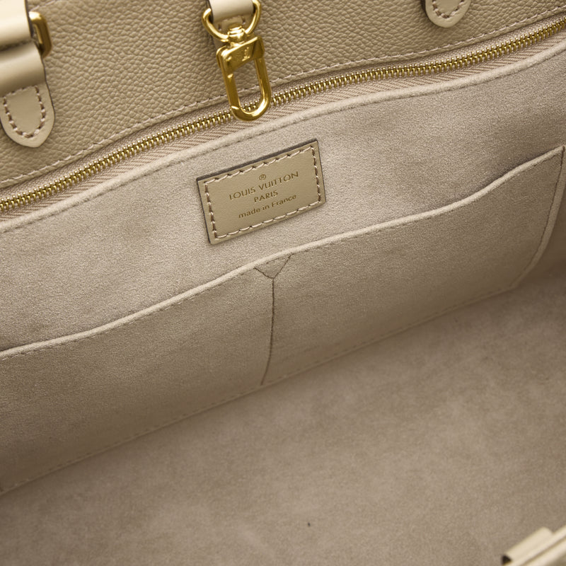 OnTheGo MM Tote bag in Monogram Empreinte leather, Gold Hardware