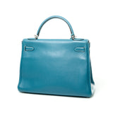 Kelly 32 Top handle bag in Clemence Taurillon leather, Silver Hardware