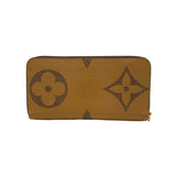 Zippy Long Brown Wallet in Monogram Coated Canvas, Gold hardware