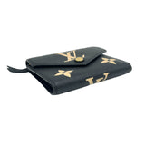 Victorine Compact Black Wallet in Monogram Empreinte Leather, Gold hardware