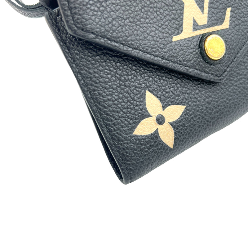 Victorine Compact Black Wallet in Monogram Empreinte Leather, Gold hardware