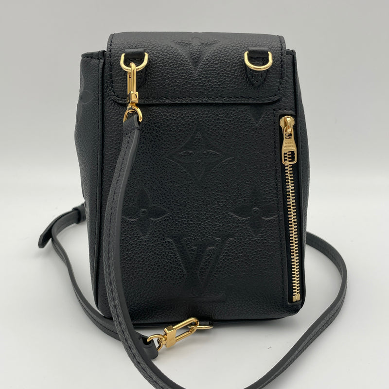 Tiny backpack Backpack in Monogram Empreinte leather, Gold Hardware