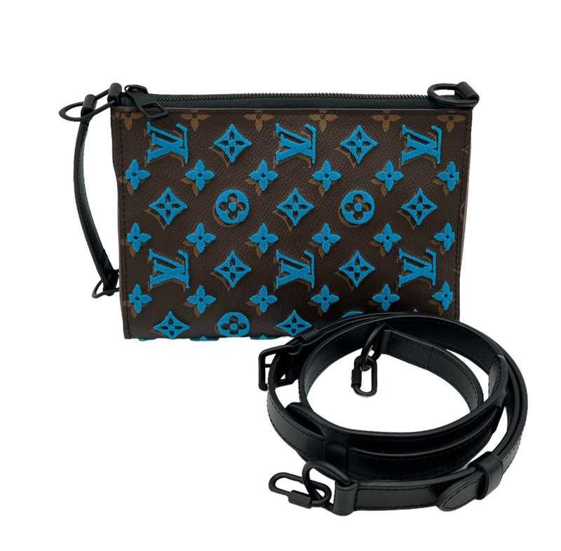 Tuffetage Triangle Messenger bag in Monogram coated canvas, Lacquered Metal Hardware