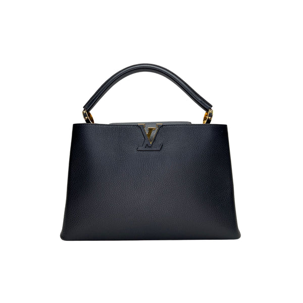 Capucines MM Top handle bag in Taurillon leather, Gold Hardware