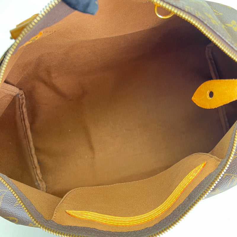 Speedy 35 Top handle bag in Monogram coated canvas, Gold Hardware