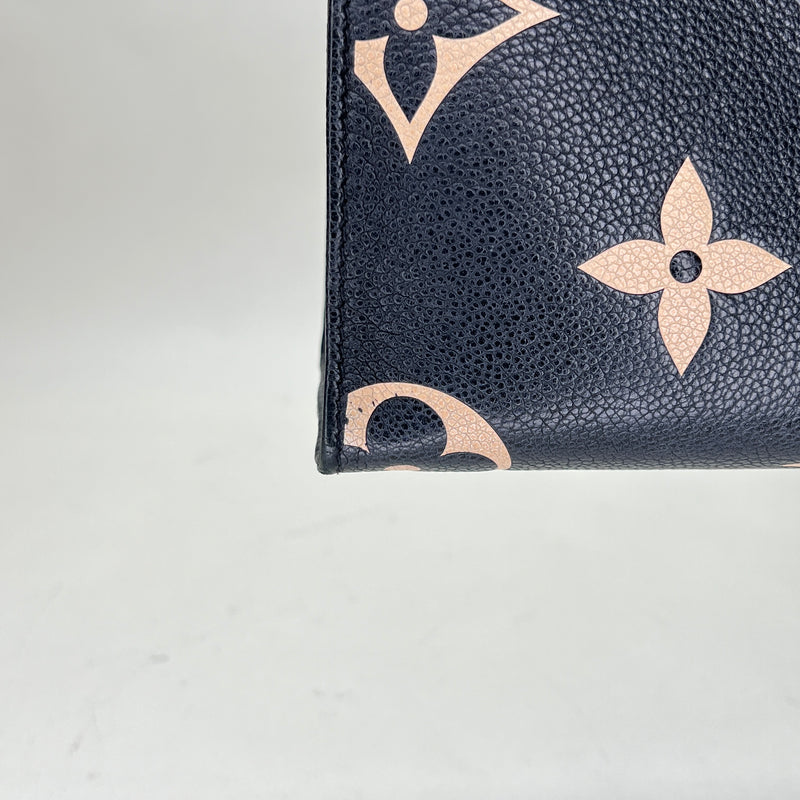 Onthego PM Top handle bag in Monogram Empreinte leather, Gold Hardware