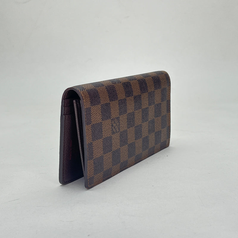 Brazza Long Wallet in Monogram coated canvas, Gold Hardware