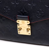 Metis Pochette Crossbody bag in Monogram Empreinte leather, Gold Hardware