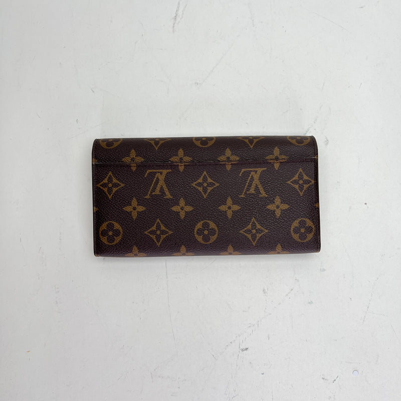 Sarah Long Flap Wallet in Monogram coated canvas, Gold Hardware