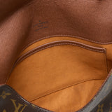 Musette Tango Shoulder bag in Monogram coated canvas, Gold Hardware
