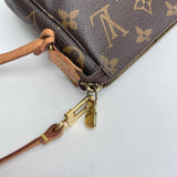 Pochette Accessoires  Shoulder bag in Monogram coated canvas, Gold Hardware