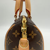 Speedy Bandouliere 20 Top handle bag in Monogram coated canvas, Gold Hardware