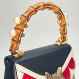 GG Supreme Wild Ones Fox on Broche Small Top handle bag in Coated canvas, Gold Hardware