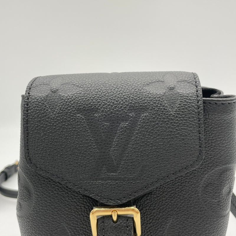 Tiny backpack Backpack in Monogram Empreinte leather, Gold Hardware
