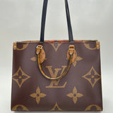 OnTheGo MM Top handle bag in Monogram coated canvas, Gold Hardware