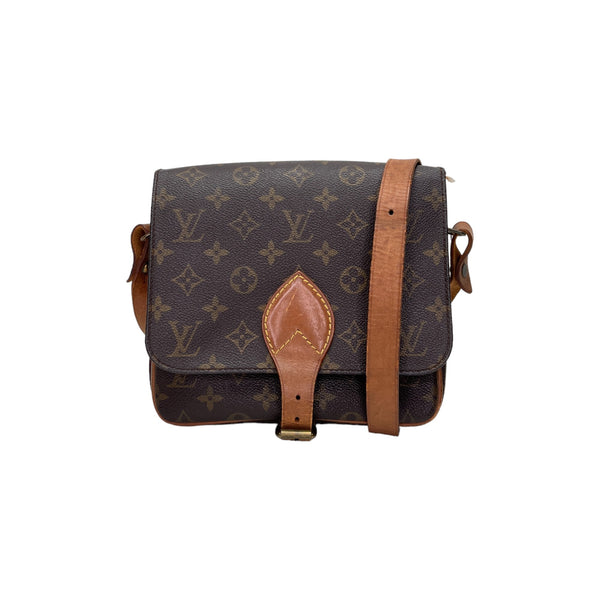 Cartouchiere MM Crossbody bag in Monogram coated canvas, Gold Hardware