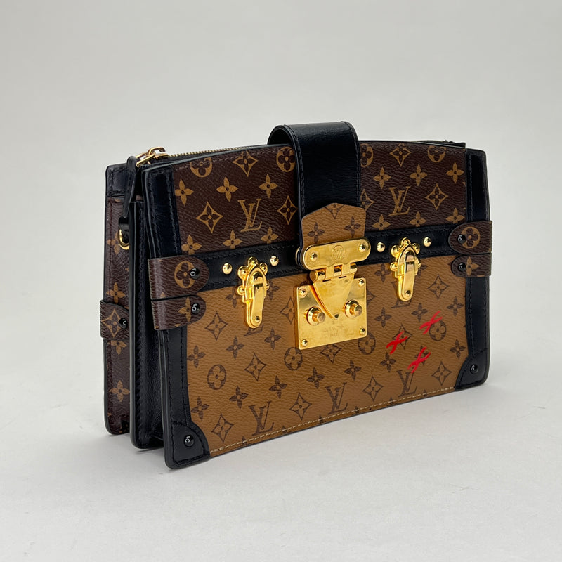 Soft trunk Clutch in Monogram coated canvas, Gold Hardware
