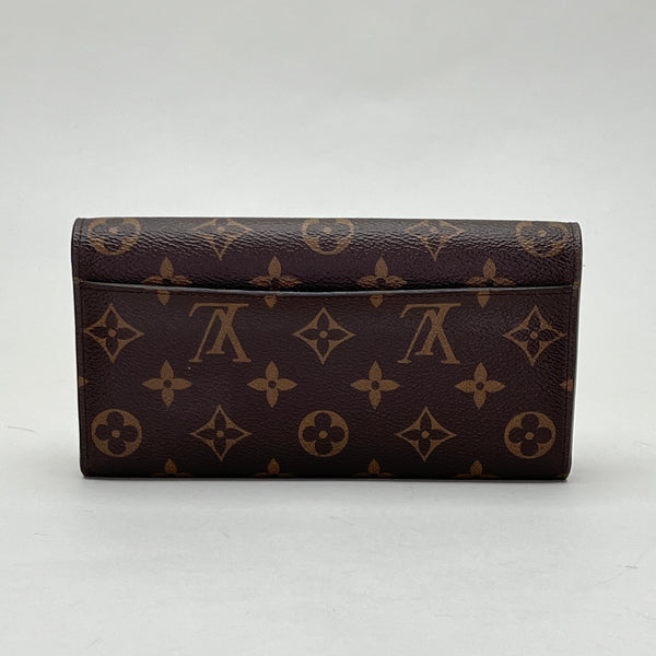Sarah flap Wallet in Monogram coated canvas, Gold Hardware
