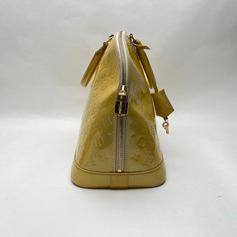 Alma MM Top handle bag in Monogram Vernis leather, Gold Hardware