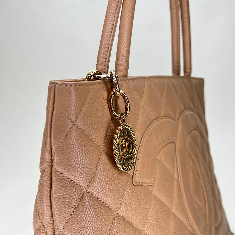 MEDALLION TOTE Medium Top handle bag in Caviar leather, Gold Hardware
