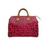 Speedy Graffiti Stephen Sprouse 30 Top handle bag in Monogram coated canvas, Gold Hardware