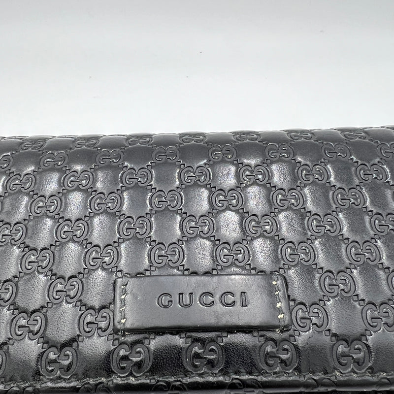 Long Flap Black Wallet in Guccissima Leather, Silver hardware